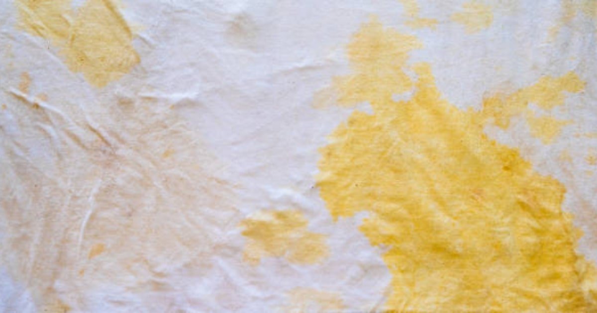 How do you remove yellow stains from old linens